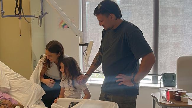 Family visiting Remuna Avaemai as he recovers in a Gold Coast hospital. Picture: supplied