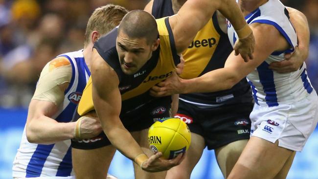 Shaun Grigg tackled by Jack Ziebell.
