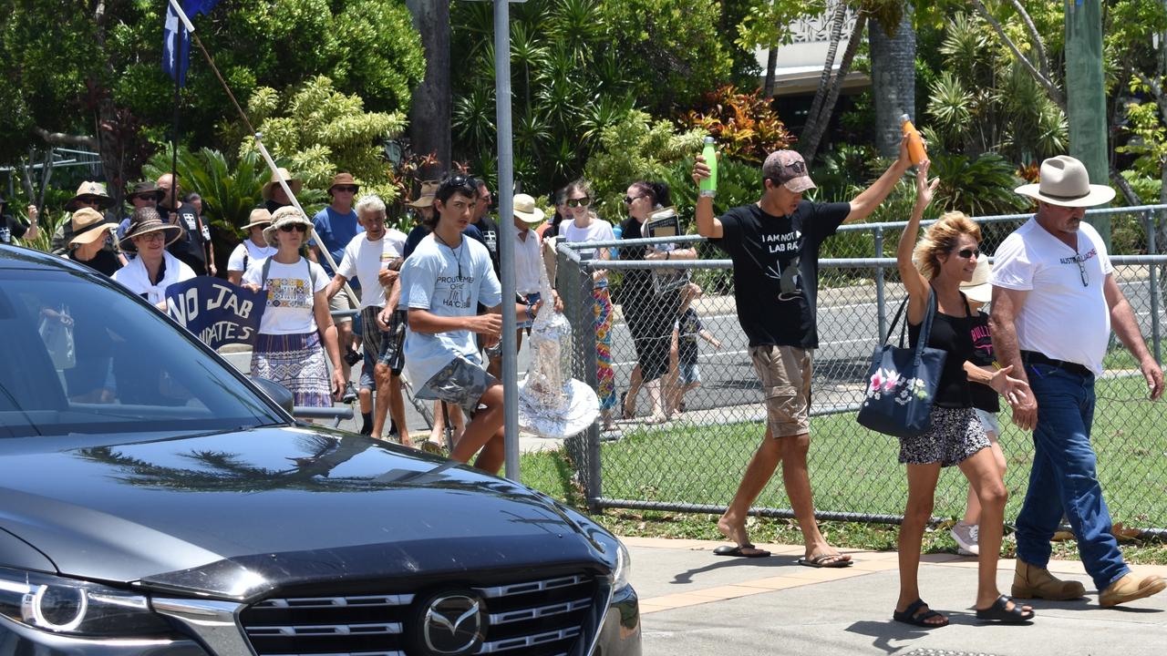 Three men were arrested as police dispersed a large crowd of protesters at Caneland Central in Mackay.