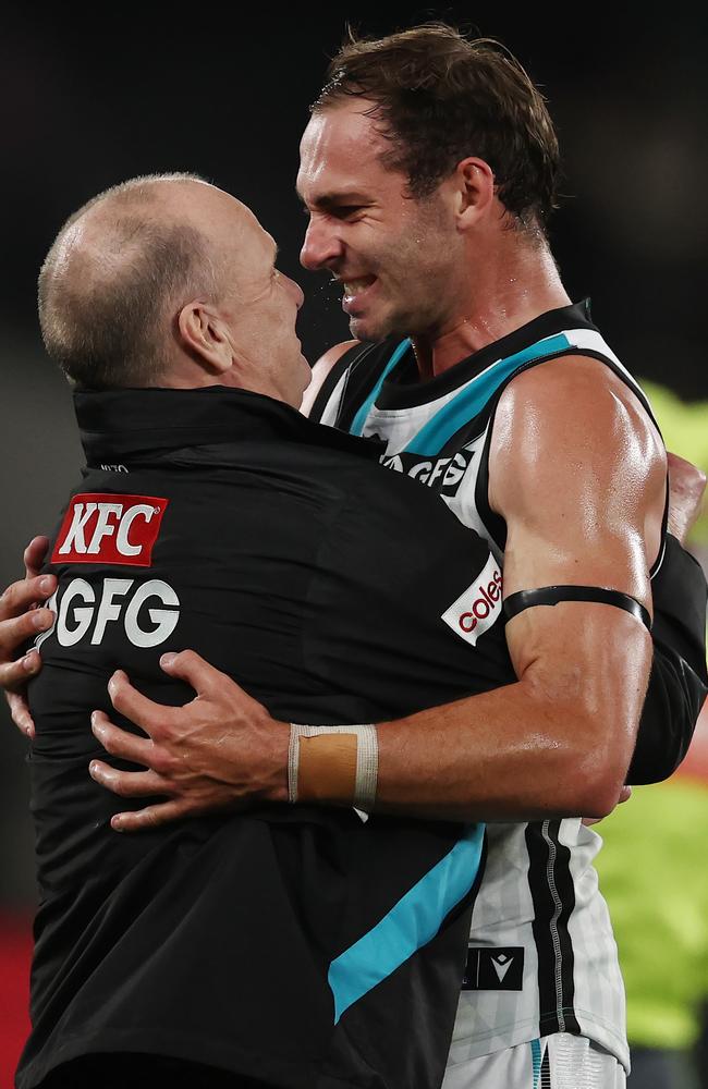 Ken Hinkley hugs Jeremy Finlayson last year. Picture: Michael Klein