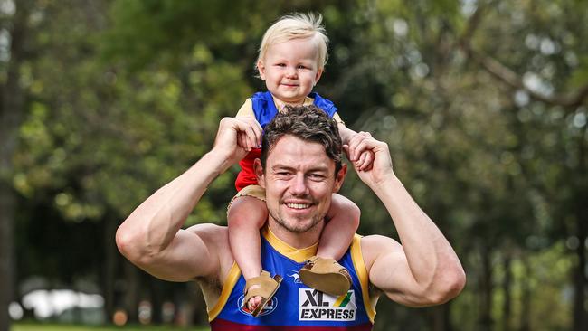 Brisbane Lions player Lachie Neale with 11-month-old daughter, Piper. Picture: Zak Simmonds