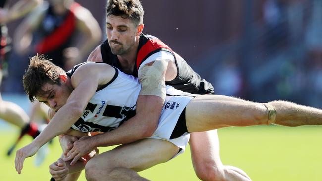 David Myers dumps Collingwood’s Josh Thomas to the ground on Saturday Picture: Michael Klein.