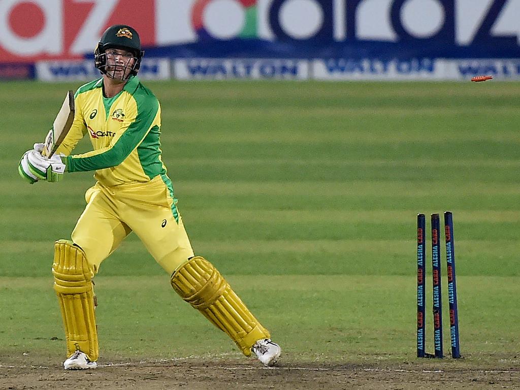 Alex Carey is clean bowled by Bangladesh's Mohammad Saifuddin.