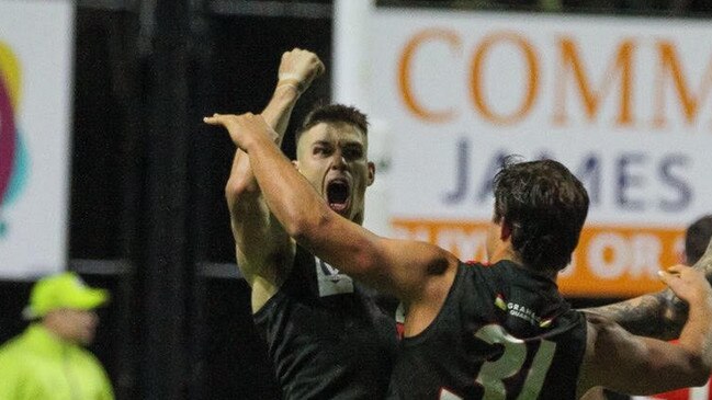 Mitch Cox is exultant after kicking a goal for Frankston. Pic: Matt Walker