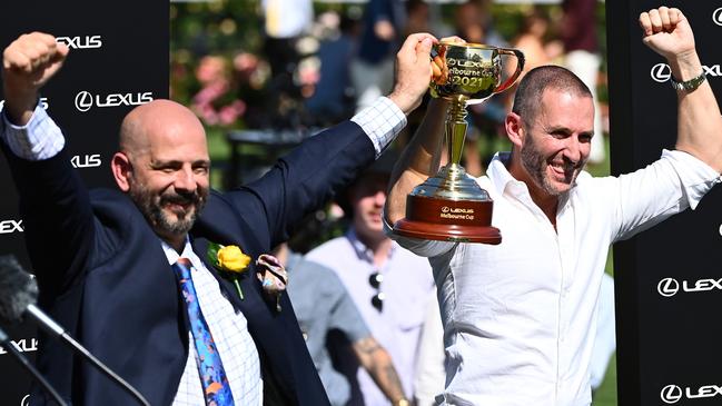 Verry Elleegant’s owners Brae Sokolski (right) and Ozzie Kheir (left) celebrate her victory in the Melbourne Cup. Picture: Getty Images