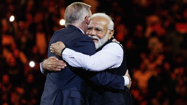 Anthony Albanese and Modi hug. Picture: NCA NewsWire / David Swift