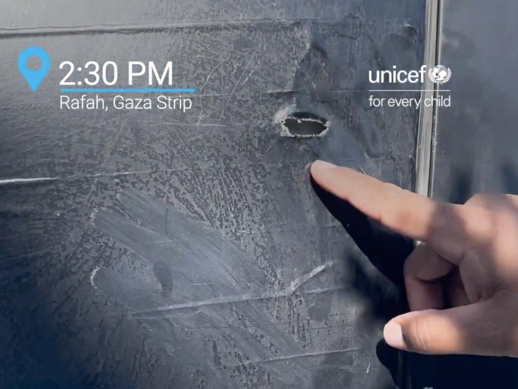 Shots struck the vehicle but the UNICEF team was not hurt.