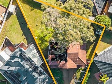 32 Groote Avenue, Hinchinbrook is for sale with one side of the duplex gutted with fire damage and missing its roof. NSW Real Estate