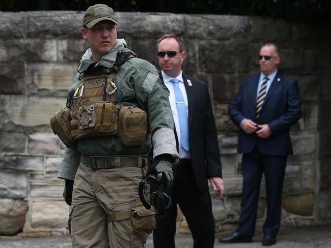 American Secret Service agents secure Kirribilli House in Sydney as US Vice President Mike Pence arrives.