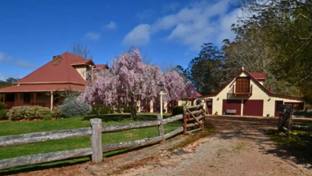 The outside of the farm shows a rustic living opportunity. Picture: YouTube