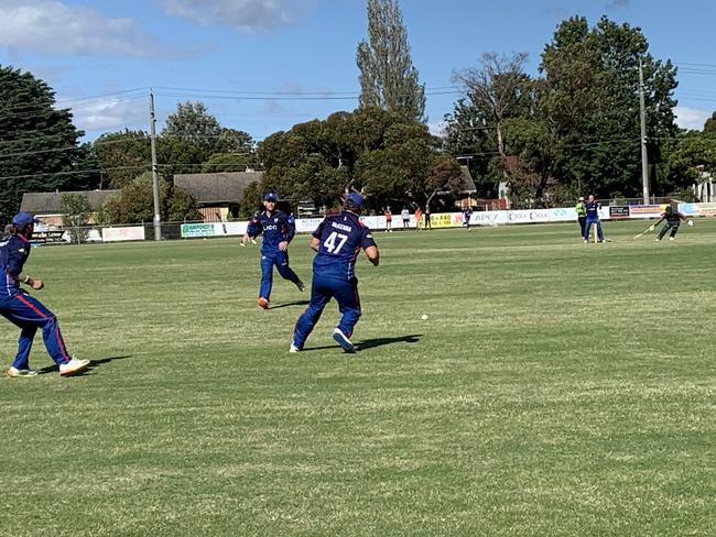 Aidan McKenna is about to gather and run out Pines' Riki Anstiss off the final ball.