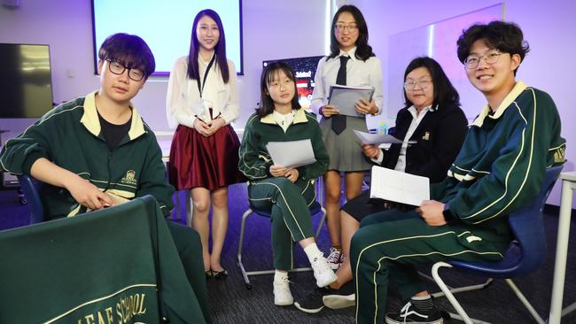 Students and their teacher at Maple Leaf Chinese international school last year: Bill Calzhengxi, Shirley Gao, Betsy Zuoruzhen, Cynthia Zhao Xinya, Nitu Li Bai Yi, and Garfield Yang. Picture: Dean Martin