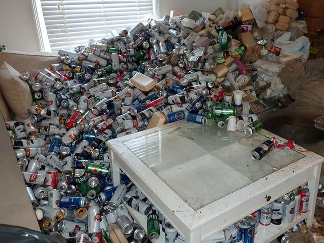 PIC FROM Kennedy News and Media (PICTURED: THE MESS LEFT BY A TENANT FROM HELL WHICH WAS CLEARED OUT BY CLEANER FREDDIE GILLIUM-WEBB) A tenant from hell transformed a pleasant two bedroom flat into a sea of 8,000 beer cans, rotting food and a toilet piled four feet high with waste - with spider webs so thick they had ensnared beer cans in them. Cleaner and wastewater management expert Freddie Gillium-Webb was given the task of clearing up the stomach-churning mess by his landlord pal once the problem tenant finally left after a year of paying no rent and trashing the flat. However the 29-year-old could not have imagined the horrors that awaited him once inside the first floor, two-bedroom and one-bathroom flat in the Andover area of Hampshire, which was so extreme he felt compelled to take pictures. DISCLAIMER: While Kennedy News and Media uses its best endeavours to establish the copyright and authenticity of all pictures supplied, it accepts no liability for any damage, loss or legal action caused by the use of images supplied and the publication of images is solely at your discretion. SEE KENNEDY NEWS COPY - 0161 697 4266