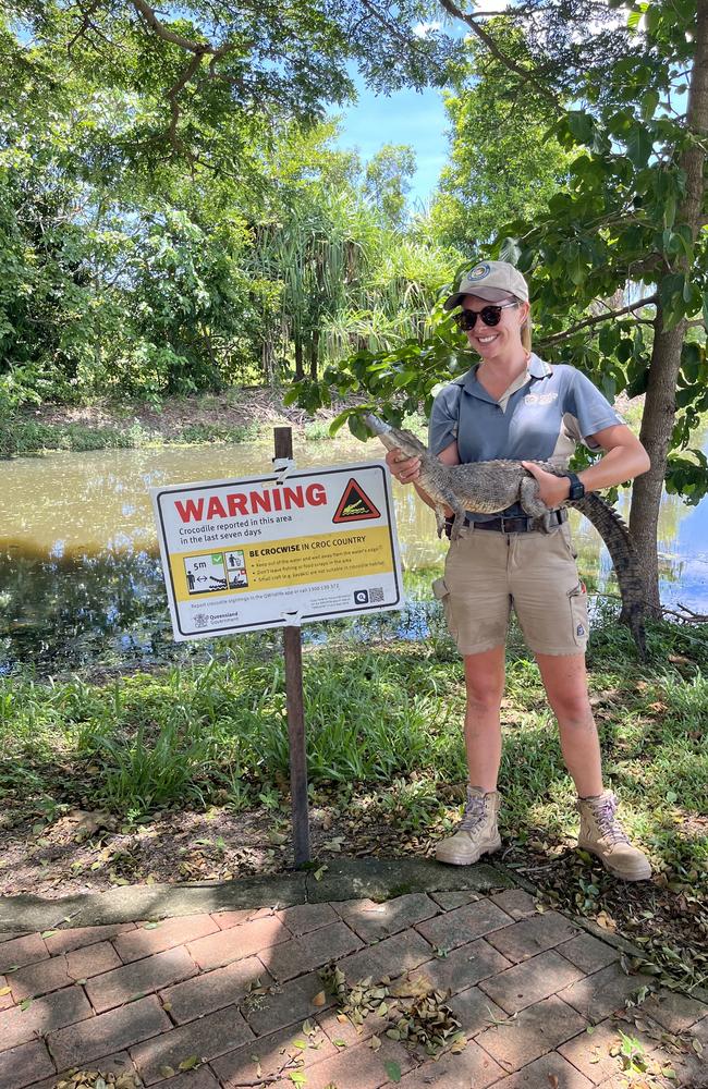 Wildlife officer Ella Meeve with the crocodile.