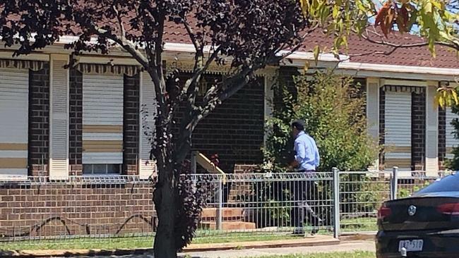 Detectives doorknock neighbours near Ms Zhang’s home.