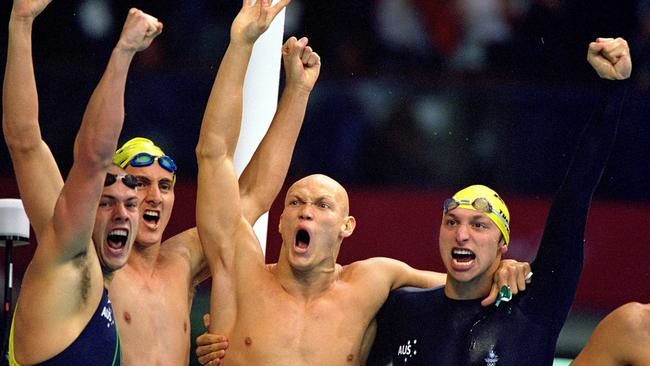 Ashley Callus, Chris Fydler, Michael Klim and Ian Thorpe celebrate after winning Gold in the Men’s 4 x 100m Freestyle Relay at the Sydney International Aquatic Centre on September 16, 2000. Credit: Al Bello /Allsport