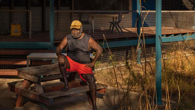 Russell Brian in front of the empty Buluhkaduru Homelands Learning Centre. He wants to see full-time education for his people. Picture: Rebecca Parker