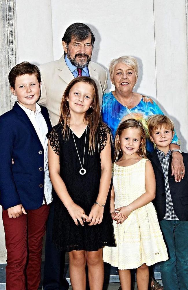 The children pose with their grandfather - Princess Mary’s father, John - and his wife Susan. Picture: Kronprinsparret
