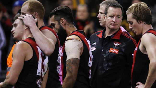 John Worsfold and his Essendon players after the 108-point loss to Hawthorn. Picture: Colleen Petch.