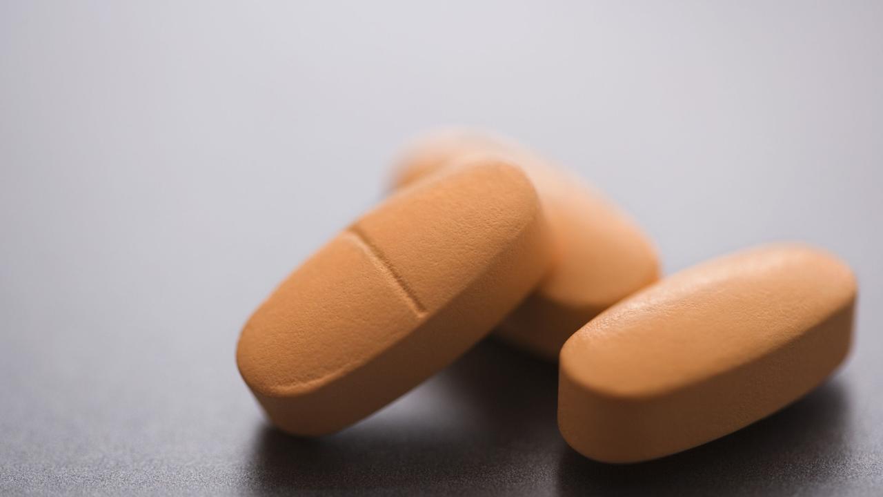 Vitamin D deficiency has been linked to autism. Pic: Generic image of multivitamin pills.