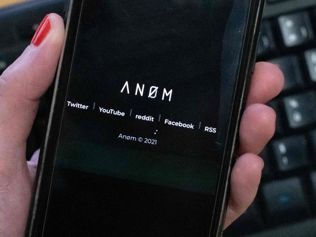 (FILES) An illustration picture shows the ANoM logo displayed on the screen of an smartphone on June 8, 2021 in Paris. The US offered a $5 million reward on June 7, 2023, for the Swedish man who marketed an encrypted communications network for drug traffickers -- unaware that the technology was developed by the FBI. The State Department posted the hefty reward for Maximilian Rivkin, who has escaped arrest since the 2021 takedown of the ANOM network. (Photo by Olivier MORIN / AFP)