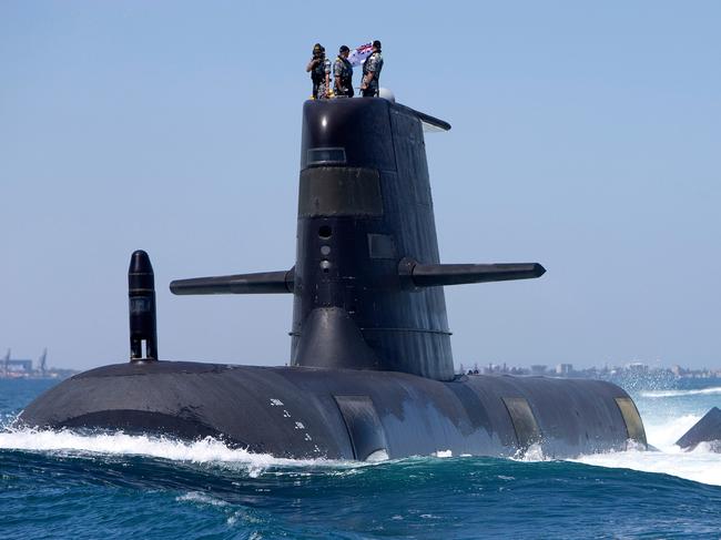 Collins Class Submarines, HMAS Collins, HMAS Farncomb, HMAS Dechaineux and HMAS Sheean in formation while transiting through Cockburn Sound, Western Australia. *** Local Caption *** Royal Australian Navy Collins Class Submarines, HMAS Collins, HMAS Farncomb, HMAS Dechaineux and HMAS Sheean sail in formation while transiting through Cockburn Sound, Western Australia, in February 2019.