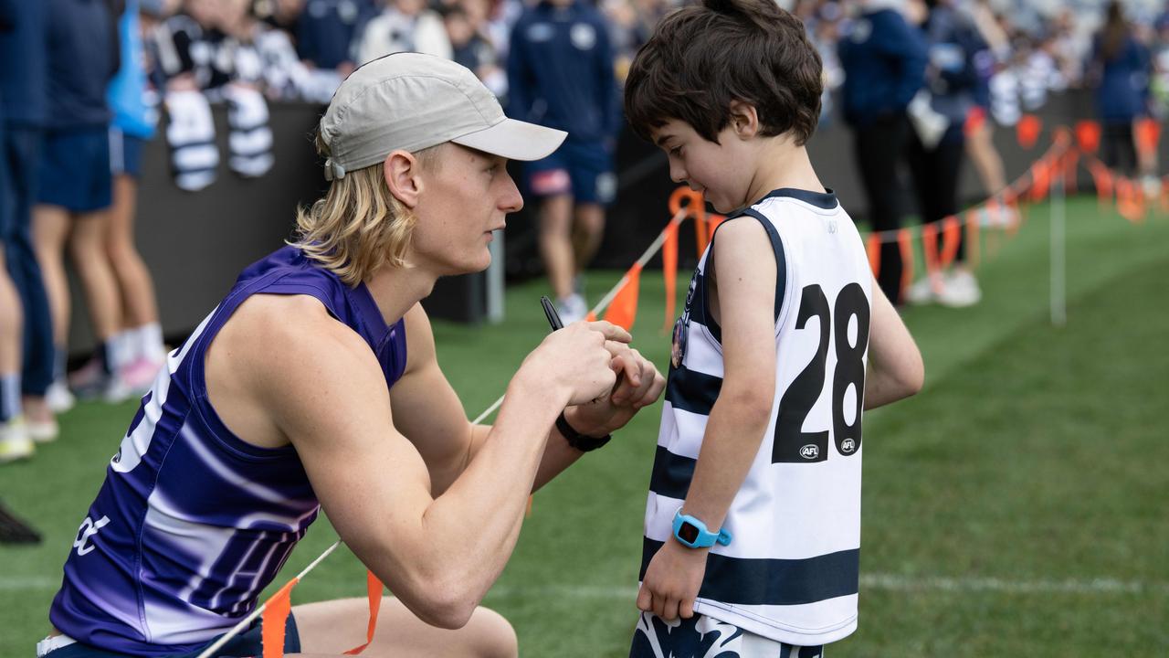 Dempsey with young fan Ollie De Stefano. Picture: Brad Fleet