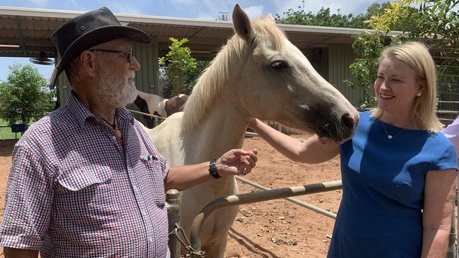 Fannie Bay Equestrian Club president Jurgen Dous introduced Acting Chief Minister Nicole Manison to his horse Belle. Picture: Sierra Haigh