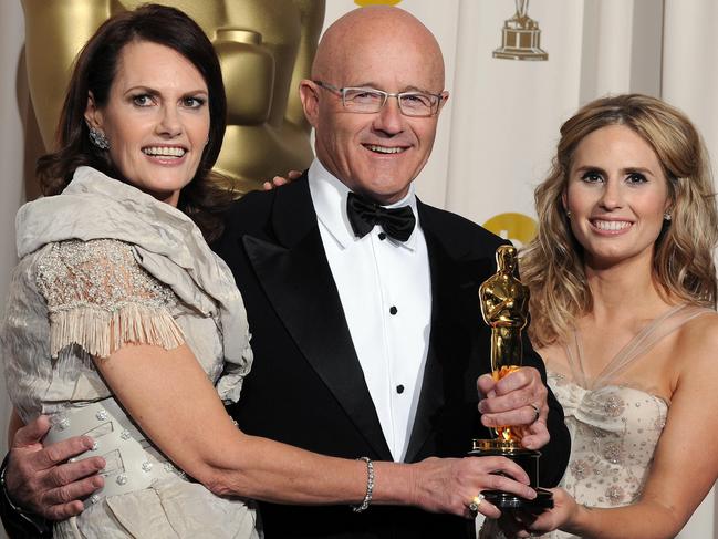 Heath Ledger's family, mother Sally, father Kim and sister Kate with the trophy at the 81st Academy Awards. Picture: AFP/Mark Ralston