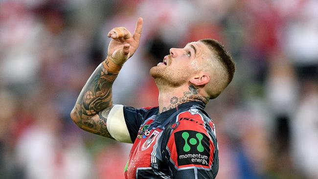Josh Dugan of the Dragons gestures after scoring a try during the Round 4 NRL match between the St George-Illawarra Dragons and the New Zealand Warriors at UOW Jubilee Oval in Sydney, Sunday, March 26, 2017. (AAP Image/Dan Himbrechts) NO ARCHIVING, EDITORIAL USE ONLY