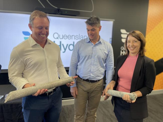 Queensland premier Steven Miles, Queensland Hydro executive manager Chris Evans, and Labor candidate for Mackay Belinda Hassan with granite samples from the site of the Pioneer Valley Burdekin pumped hydro scheme on August 9. Photo: Zoe Devenport