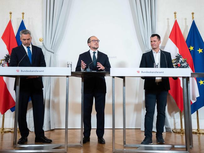 Austria's Interior Minister Karl Nehammer, Austrian Chancellor Alexander Schallenberg and Austrian Health Minister Wolfgang Mueckstein after the Covid crisis summit. Picture: AFP