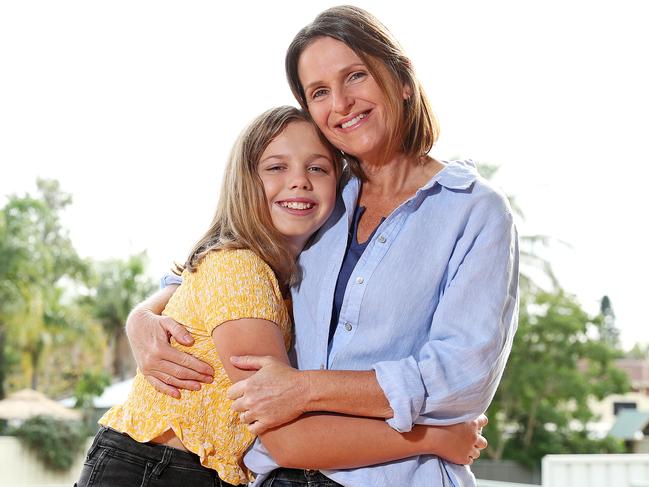 Hannah Cook 12, with her mum Penny. Picture: Tim Hunter.