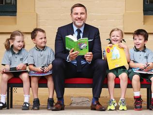 SATURDAY DAILY TELEGRAPH - 8/12/17

TV personality, comedian and author David Walliams visits Erskineville Public School to launch his new book. L to R, Kindy students with David - Olive Corben, Charlie Stewart, David Walliams, Aja Shooter and Maddox Topping. Pic, Sam Ruttyn