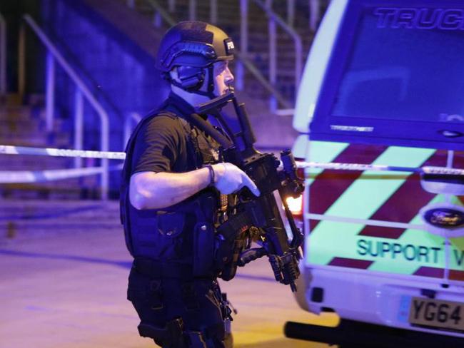 Armed police on the scene after the blast occurred. Picture: Joel Goodman/LNP