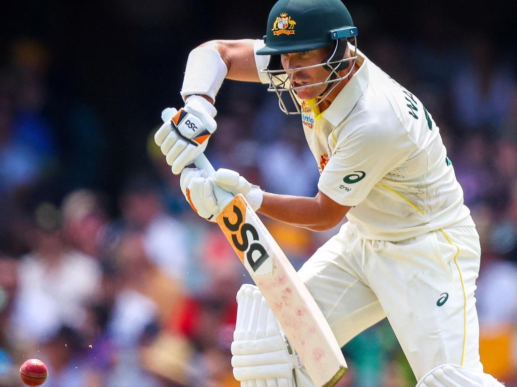 Australia's David Warner was struck on the body several times, but was only rocked, never rattled. Picture: AFP