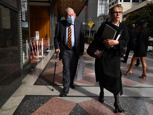 Sir Ron Brierley (left) leaves court with lawyer Penny Musgrave on Thursday. Picture: NCA NewsWire/Joel Carrett