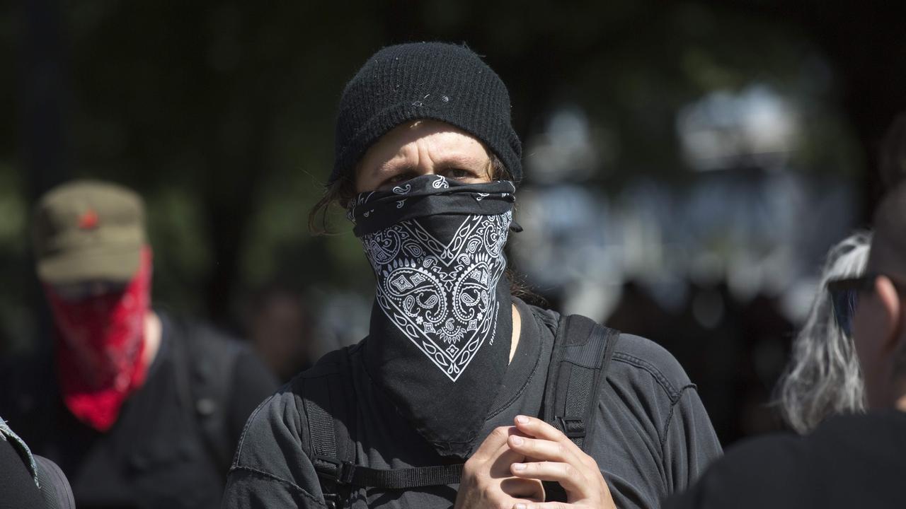 Protesters from the militant, left-wing, anti-fascist political activist movement Antifa protest in Portland, Oregon, to oppose the right wing group The Patriot Prayer Movement in 2017. Picture: AFP