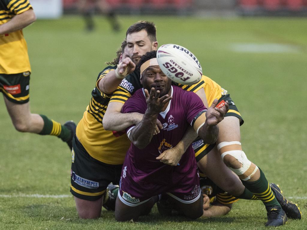 Dalby player Tomasi Naborisi passes against Wattles. Picture: Kevin Farmer.