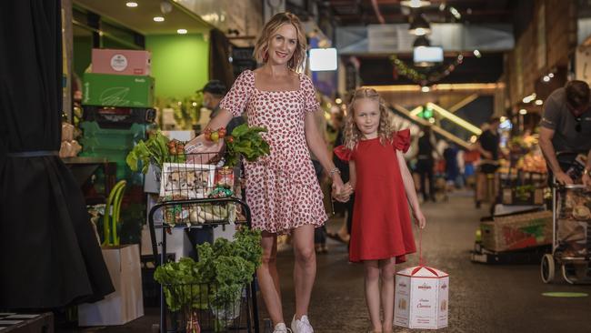 Courtney Ryder with her daughter Charli 7 at the Adelaide Central Market. Picture: Roy VanDerVegt