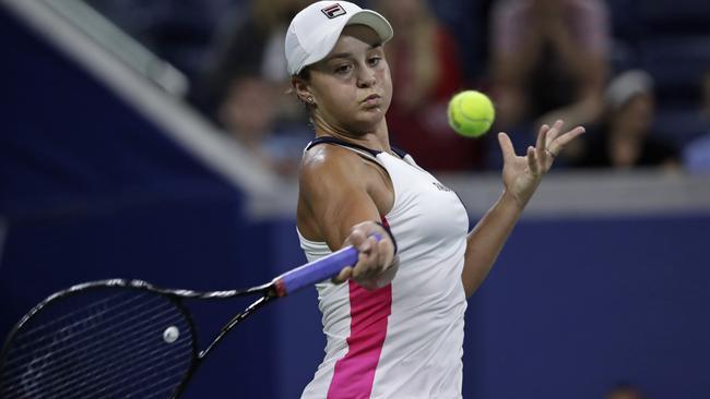 Ash Barty hits a forehand to Lauren Davis during their second-round match at the US Open in New York. Picture: AP