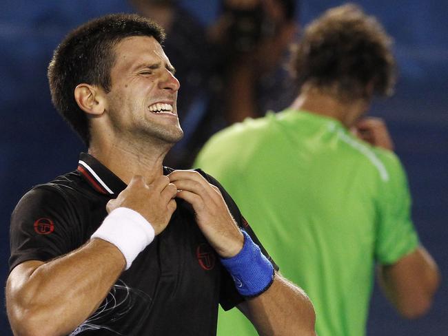 Djokovic celebrates after defeating Nadal in a match for the ages. Picture: AAP Image/How Hwee Young