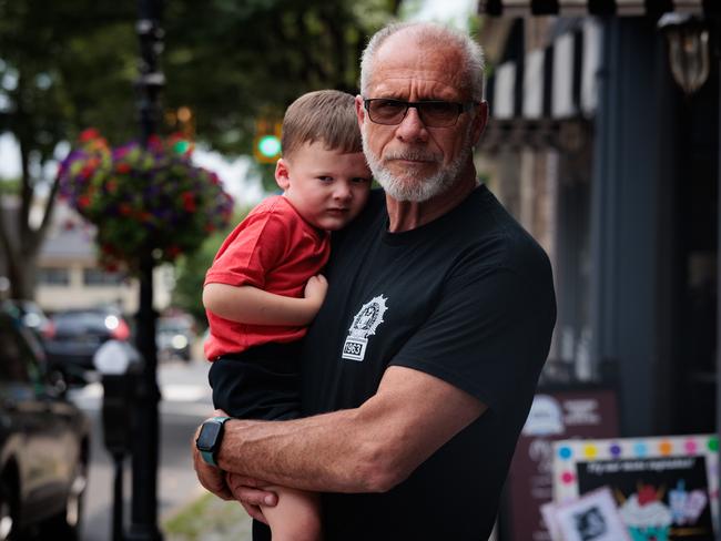 John Finnegan, 67, holds his grandson Steven, 3 in Doylestown, Bucks County, Pennsylvania. Picture: Hannah Beier