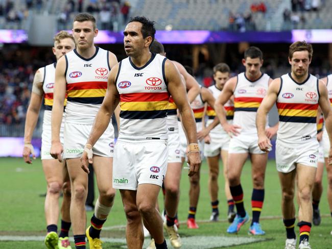 Eddie Betts leads Crows players off the field after losing the Round 12 AFL match between the Fremantle Dockers and the Adelaide Crows at Optus Stadium in Perth, Sunday, June 10, 2018. (AAP Image/Richard Wainwright) NO ARCHIVING, EDITORIAL USE ONLY