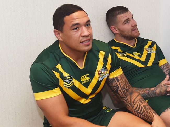 Members of the Kangaroos Four Nations Squad, Tyson Frizell, (left), Josh Dugan and Blake Ferguson (right) talk before a team photograph in Sydney on Thursday, Oct. 6, 2016. The 2016 Rugby League Four Nations tournament will be played in England in October and November with the series being contested by Australia, England, New Zealand and Scotland. (AAP Image/Paul Miller) NO ARCHIVING