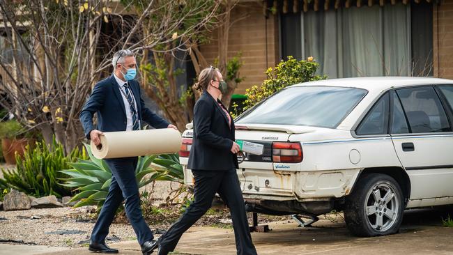 Major Crime detectives recover items from a home in Christie Downs, in relation to the case of missing man Robert Atkins, on July 23, 2021. Picture: Tom Huntley