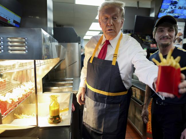 Donald Trump at the McDonald’s frier in Feasterville-Trevose, in the swing state of Pennsylvania. Picture: Doug Mills/The New York Times via AP, Pool