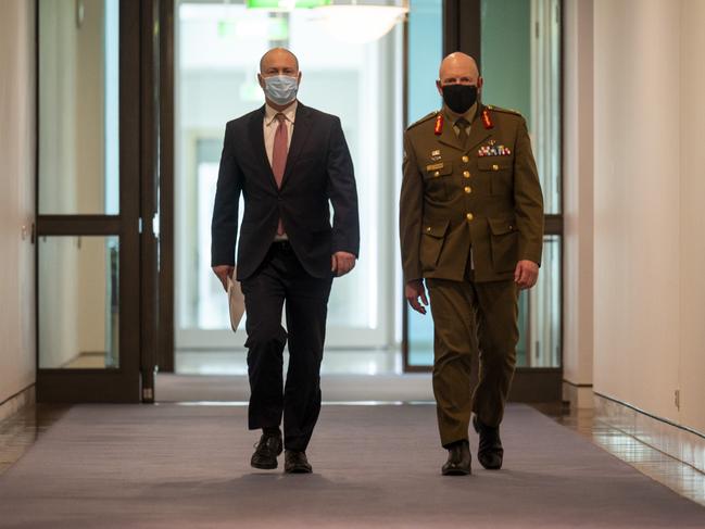 Treasurer Josh Frydenberg MP and Lieutenant General John Frewen shortly before today’s press conference at Parliament House. Picture: NCA NewsWire / Martin Ollman