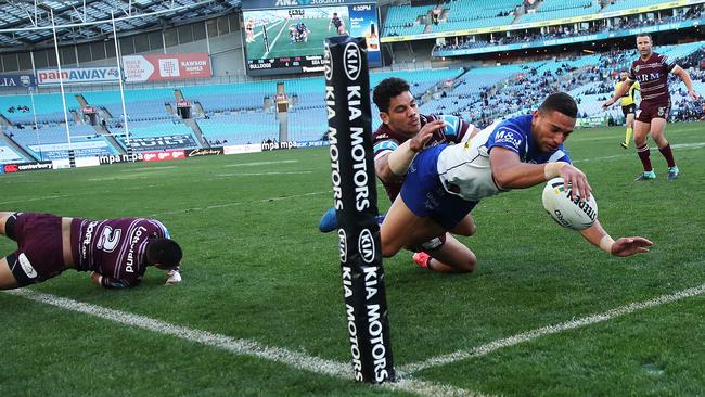 Marcelo Montoya dives over to score a try for the Bulldogs. Picture: Phil Hillyard