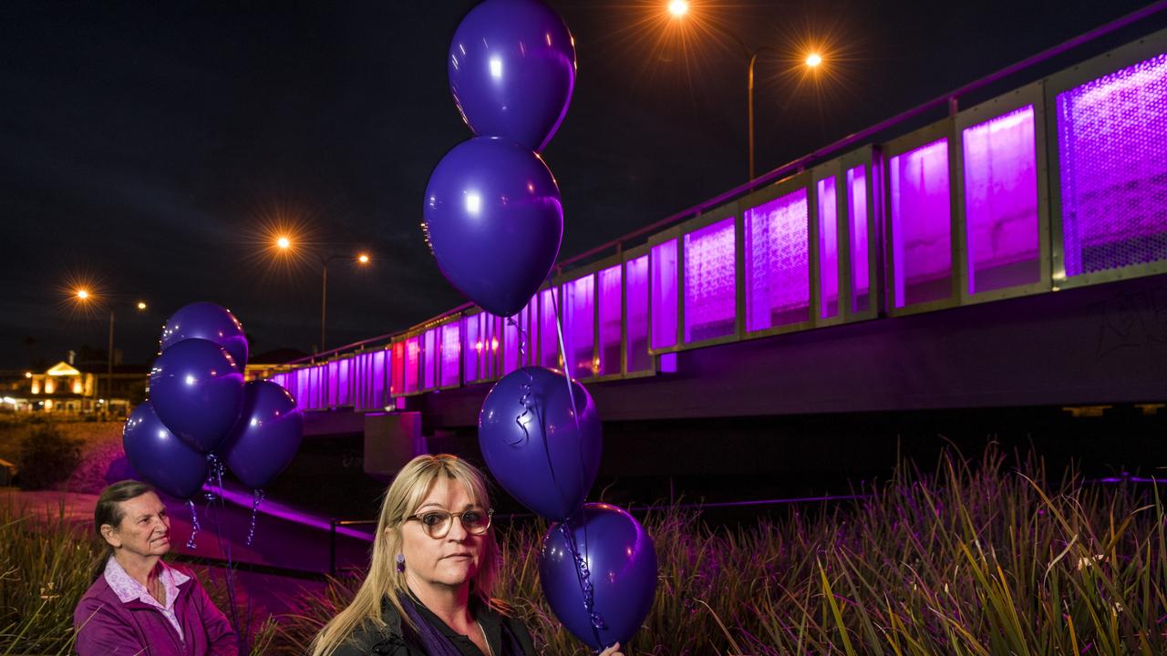 Sue Williams (left) and Drug ARM Toowoomba family support coordinator Tess Heming stood in front of the Victoria St bridge which lit up purple in recognition of overdose awareness, last year. Picture: Kevin Farmer